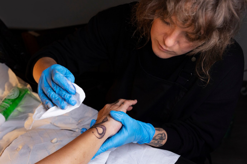 Can scars affect tattoo appearance? Learn how to prevent and minimize scarring to preserve your ink.